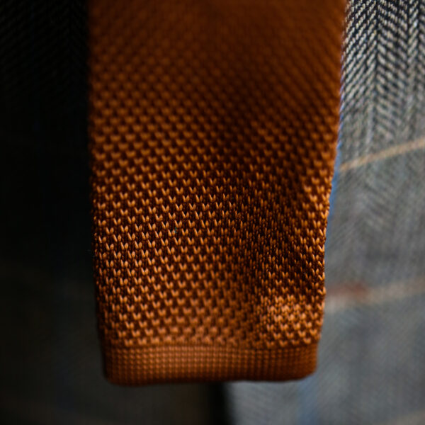 Rust knitted tie from Marc Darcy