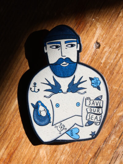 Su Owen Wooden Badge - Tattooed Sailor