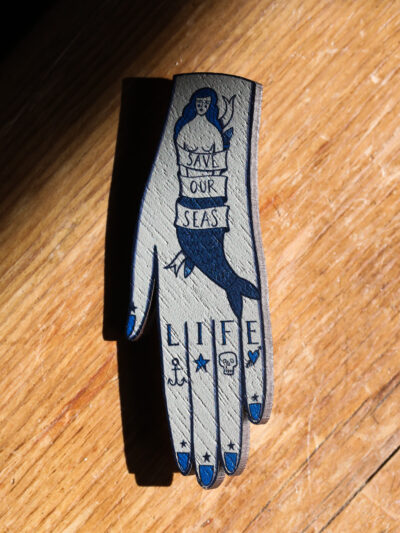Su Owen Wooden Badge - Tattooed Hand